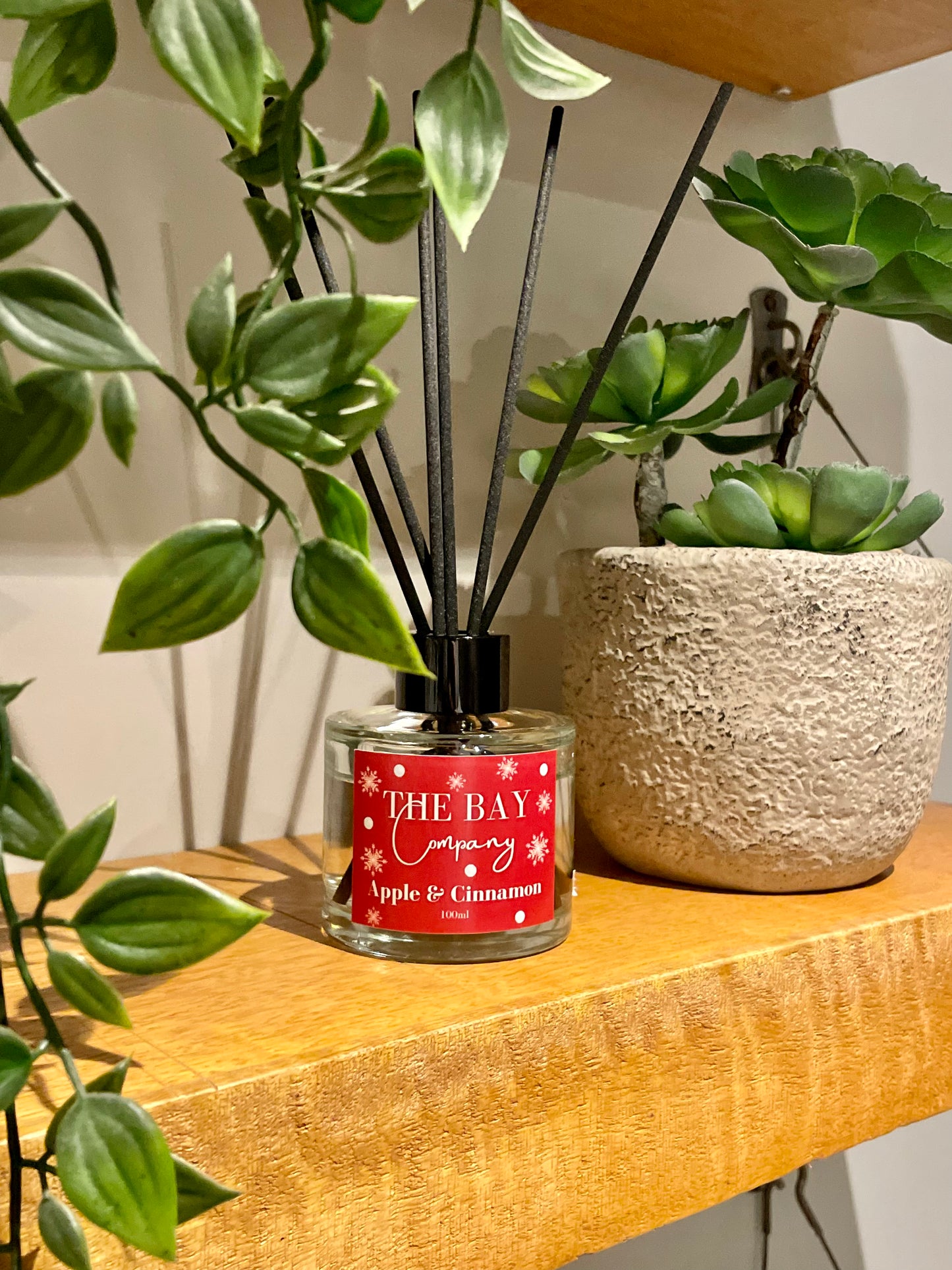 The Bay Company reed diffuser with a Christmas scent. Apple and cinnamon.