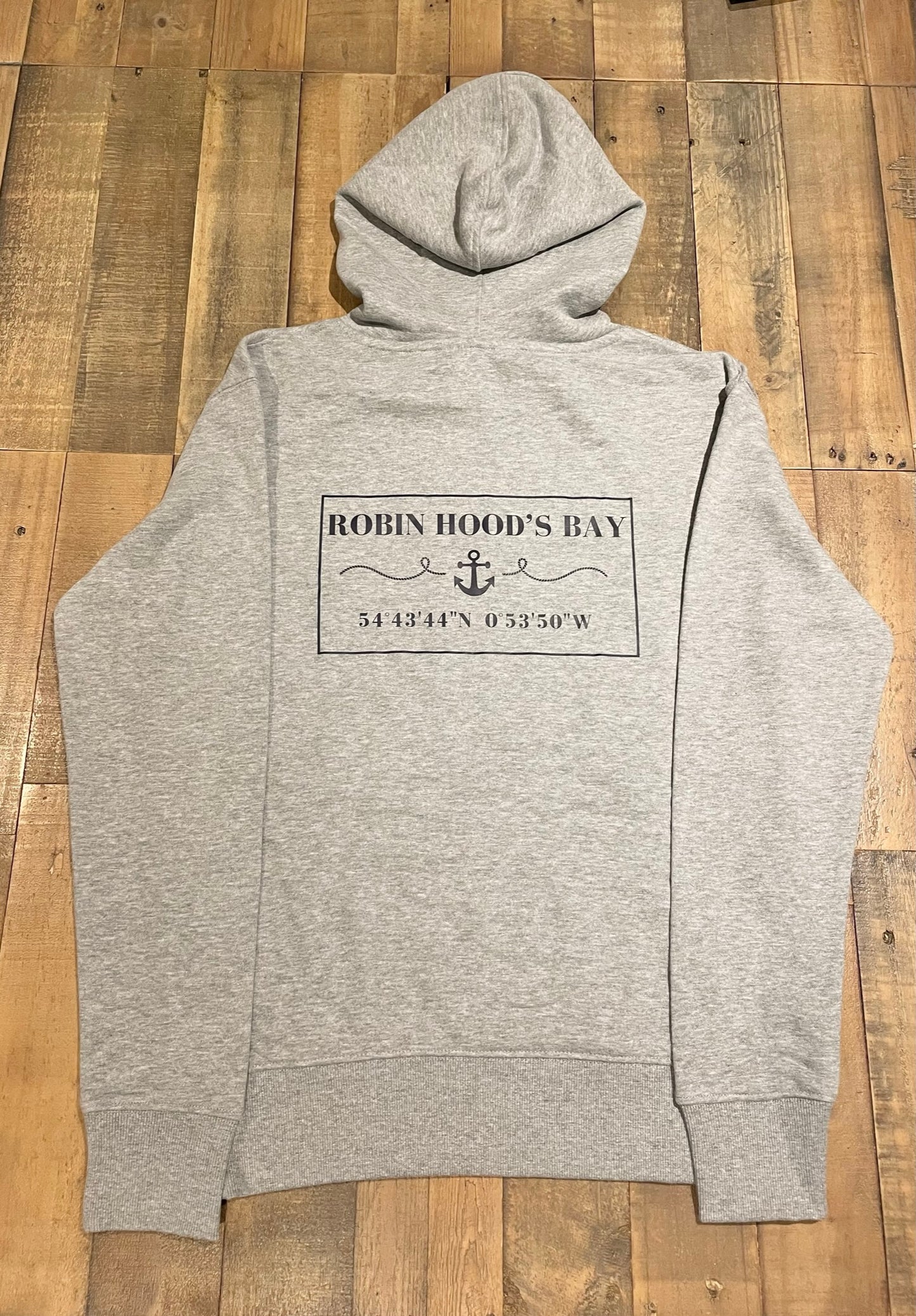 The grey “Robin Hood’s Bay” men’s hoodie from the bay company.