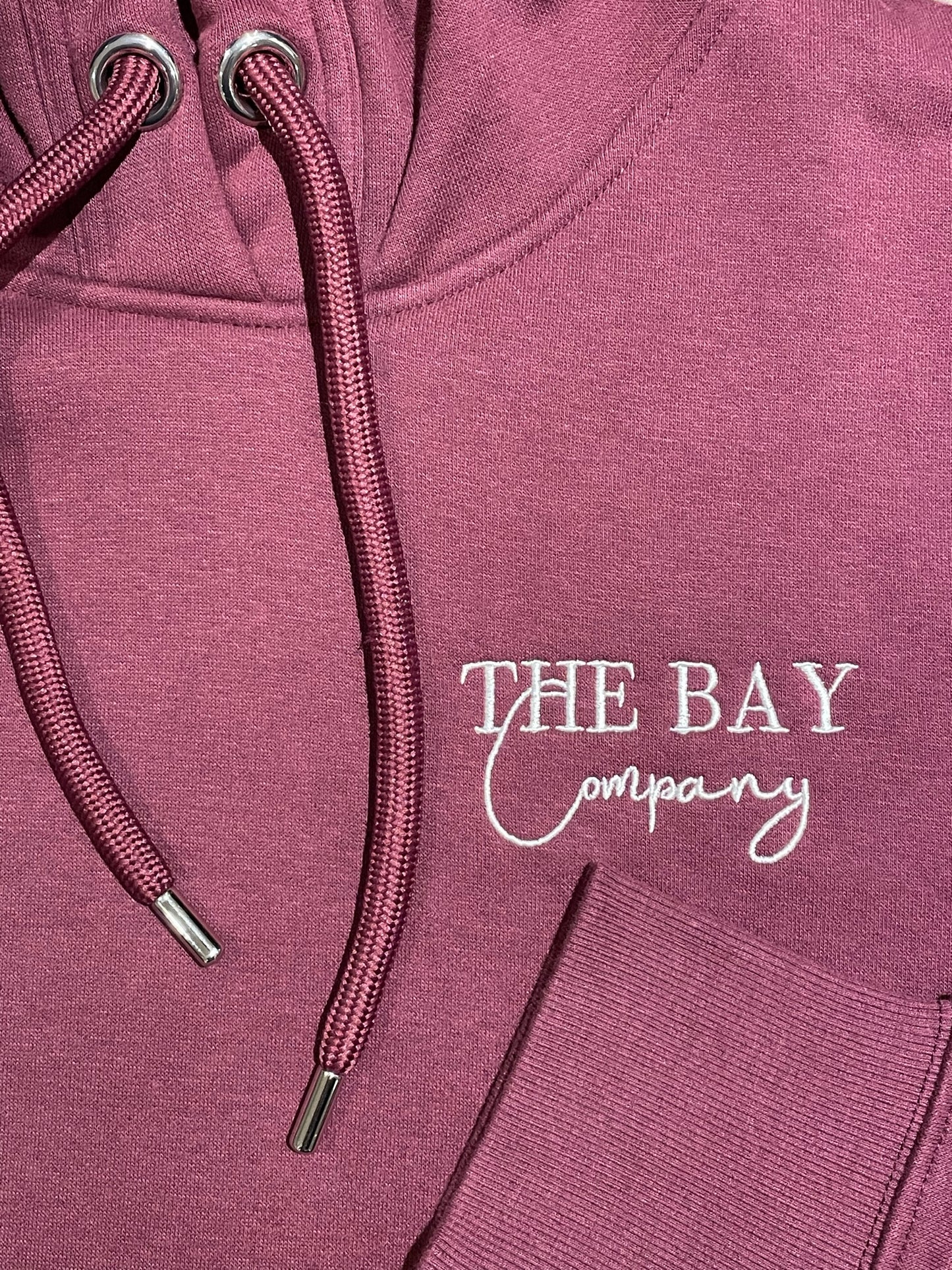 The women’s burgundy Robin Hood’s Bay hoodie from The Bay Company. Close up on detail