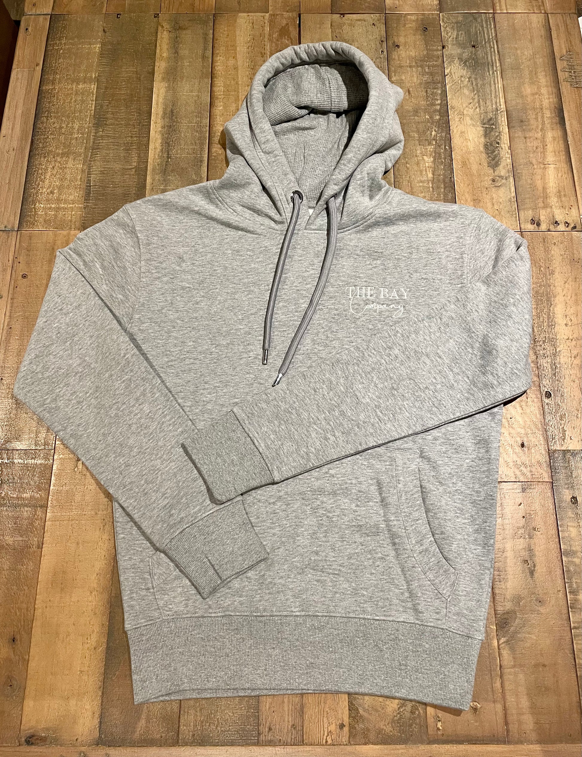 The grey “Robin Hood’s Bay” men’s hoodie from the bay company. 