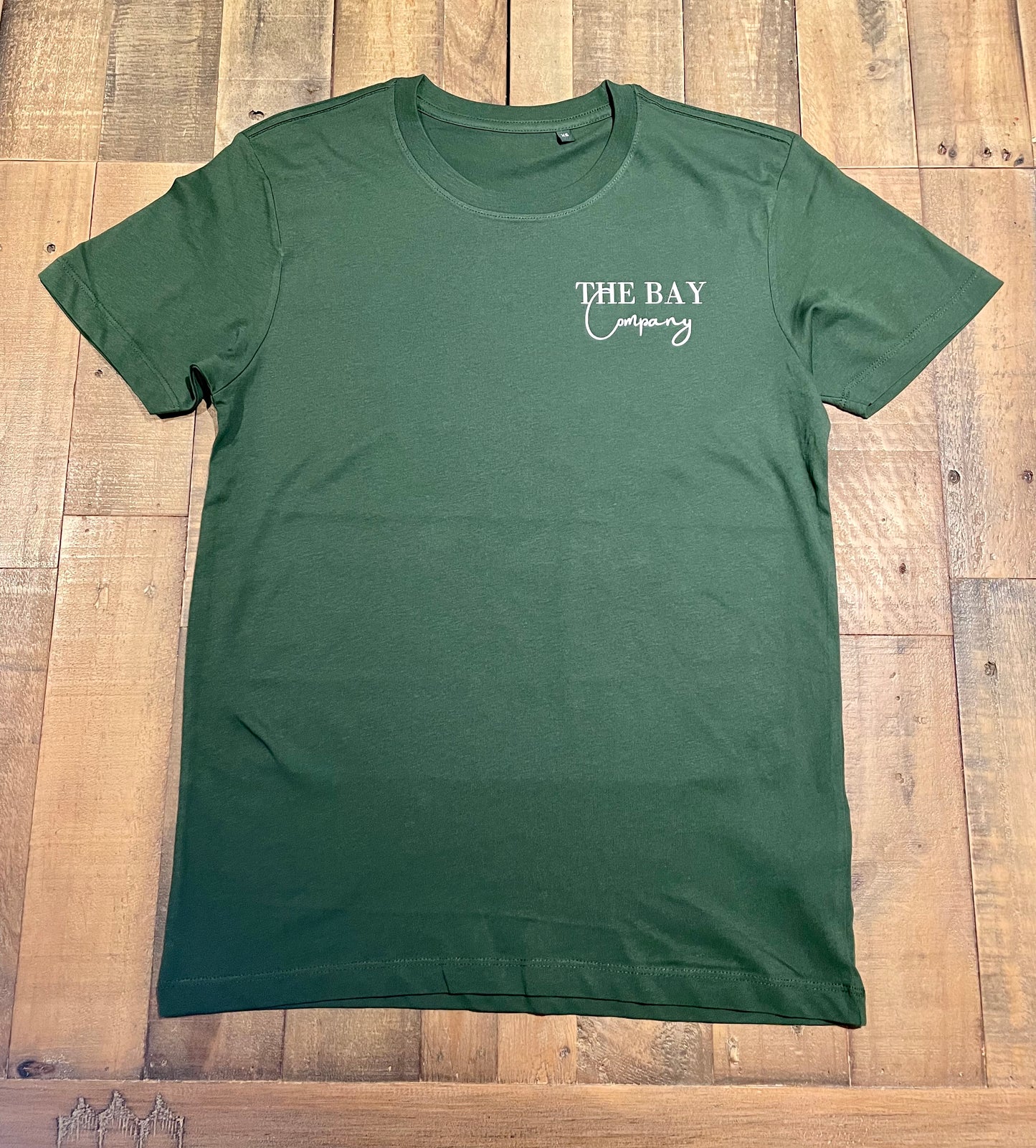 The unisex Robin Hood’s Bay T-shirts in forest green from The Bay Company. 